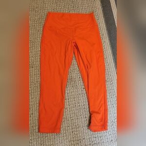 Bright orange leggings Sz 10 Lululemon